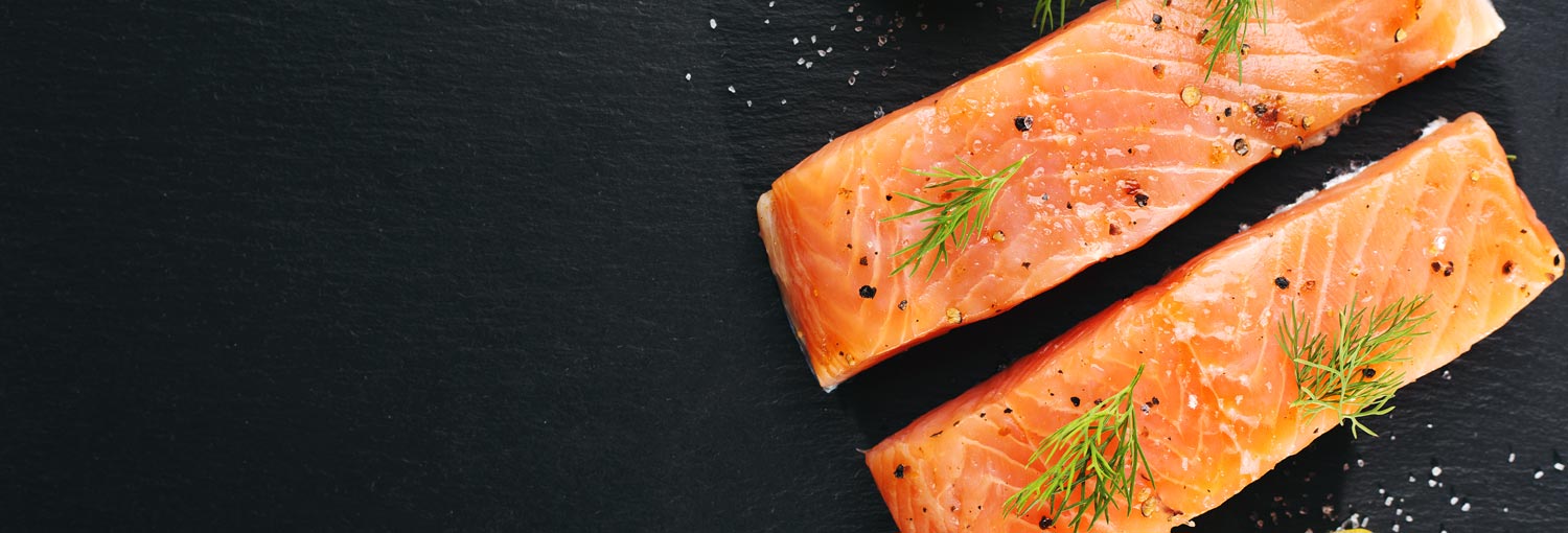 Slice of Raw Pink Salmon Steak on Black Background Top View. Thick Piece of  Fresh Red Fish, Chum or Trout Stock Photo